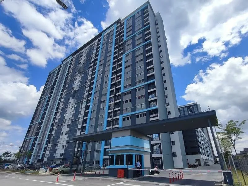 Exterior type: high-rise condominium; features: glass curtain wall, blue and grey facade, double-volume main lobby, covered entrance, surrounded by mature greenery, parking area in front, multiple storeys, balconies on upper floors; style: modern.