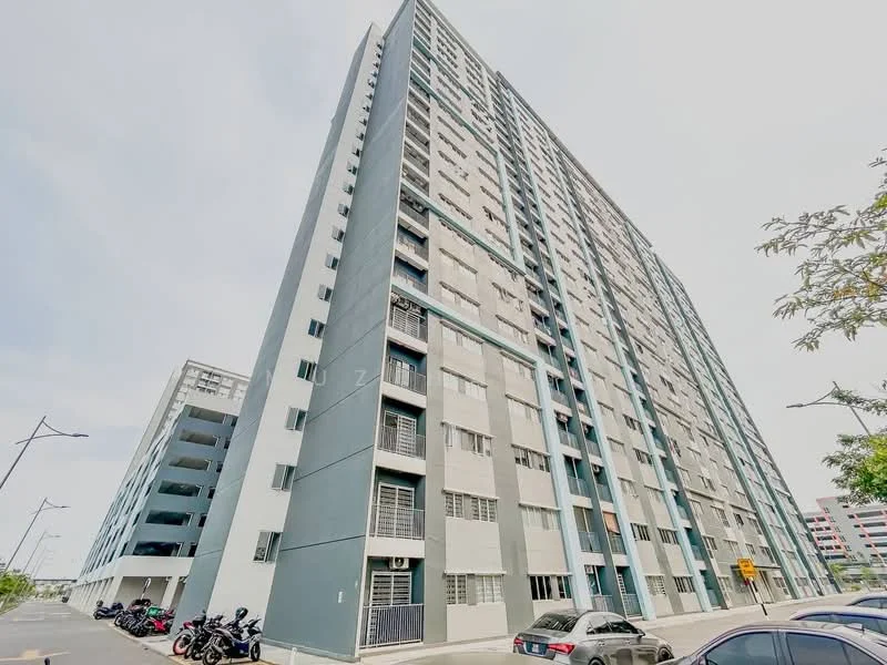 Exterior type: high-rise condominium; features: grey painted facade, balconies on upper floors, multiple windows, parking deck visible, surrounded by open space, street lighting, manicured landscaping, adjacent to parking area; style: modern.