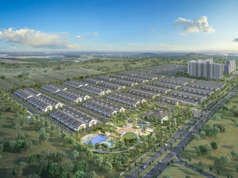 Exterior type: linked terrace house; features: landscape garden, manicured lawn, swimming pool, children's playground, multi-storey car park, surrounded by mature greenery, walking paths, modern architectural design, solar panels on rooftops, urban development with open spaces; style: modern.
