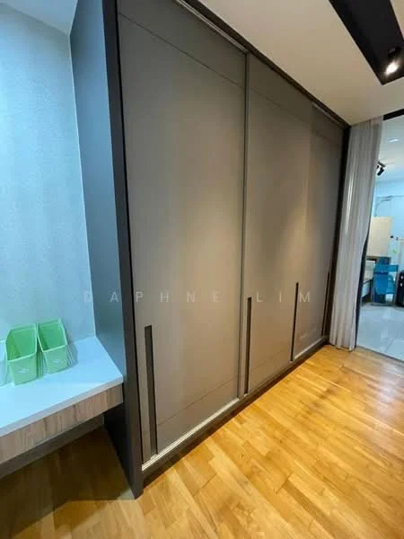 Room features: built-in wardrobe with sliding doors, light grey cabinetry, wooden flooring, white countertop, green storage boxes, textured wall, recessed lighting, curtains; style: modern.