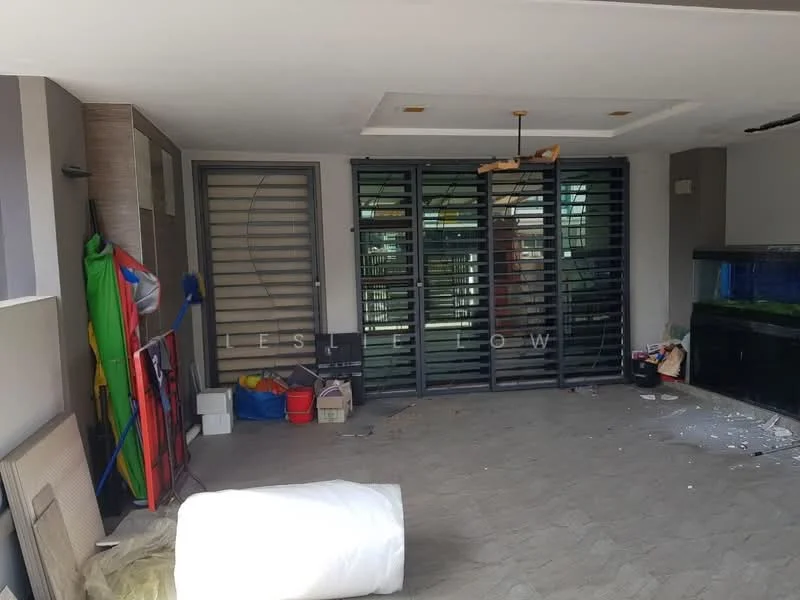 Room features: grey tiled flooring, sliding glass doors, metal security grilles, ceiling fan, wall-mounted aquarium, painted walls, various storage items, cleaning equipment, decorative items, visible clutter; style: modern.