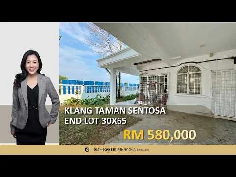 Exterior type: end lot house; features: white painted facade, arched windows, covered porch, manicured lawn, fenced yard, paved walkway, outdoor seating area, visible blue fence, landscaped garden, single-storey, surrounded by greenery; style: modern.