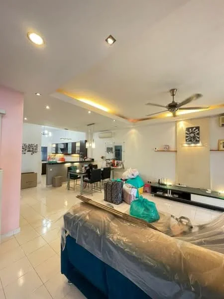 Living features: white painted walls, tile flooring, recessed downlights, 5-blade ceiling fan, sofa covered with plastic, coffee table, TV console, decorative wall shelf, open layout to kitchen, dining area with chairs, visible kitchen cabinetry, boxes and bags indicating storage or moving, natural light from windows; style: modern.