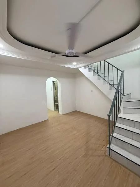 Living features: light wood laminate flooring, white painted walls, tray ceiling, ceiling fan, staircase with metal railing, arched doorway, natural light from adjacent room; style: modern.