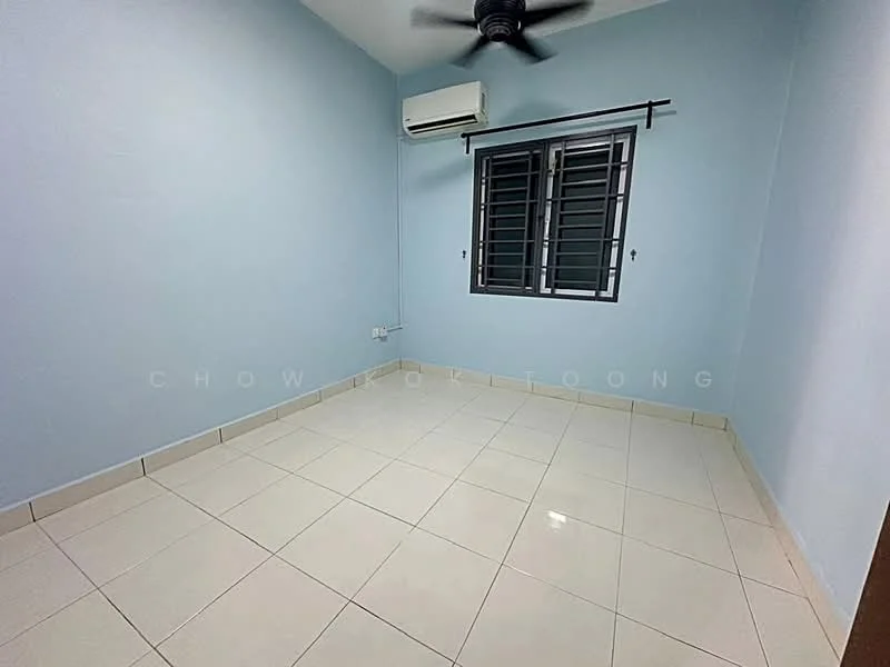 Room features: light blue painted walls, white tiled flooring, ceiling fan, 1 wall-mounted split AC, black window grills, sliding window with glass panes.