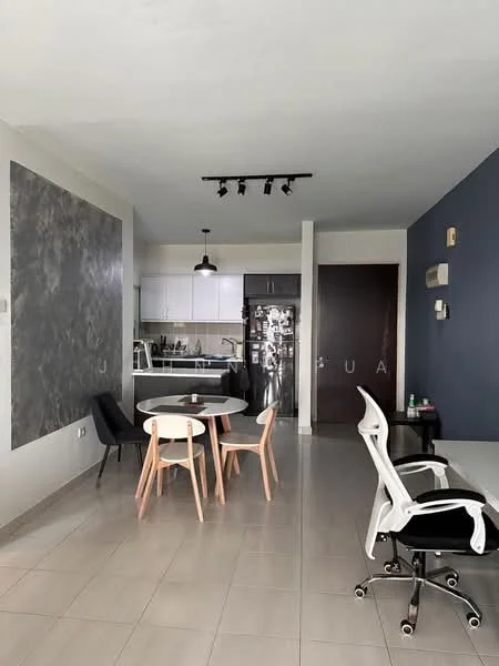 Living features: grey accent wall, white painted walls, tile flooring, recessed downlights, round dining table, 4 wooden dining chairs, black armchair, stainless-steel fridge, kitchen cabinetry, open layout, wall-mounted light fixtures, dark wood door; style: modern.