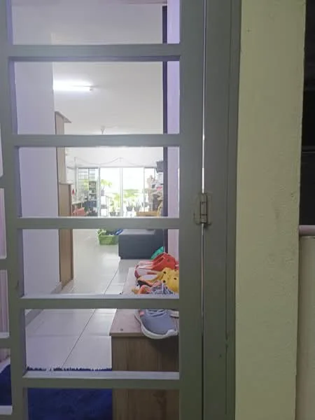 Room features: sliding glass door, white walls, tile flooring, wooden furniture, decorative items on furniture, visible outdoor area, bright lighting, open layout; style: modern; view: garden.