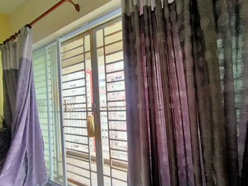 Room features: floor-to-ceiling sliding glass door, sheer curtains in light grey, blackout curtains in dark grey, metal railing, view of adjacent building, light-colored wall, window frame, curtain rod; view: city.