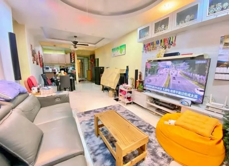 Living features: grey leather sofa, wood coffee table, area rug with geometric pattern, wall-mounted TV, entertainment unit, decorative wall shelves, ceiling fan, recessed lighting, decorative medals on display, open layout to kitchen, light-colored walls, tile flooring; style: modern. Kitchen features: kitchen cabinets, stainless-steel appliances, countertop, open layout to living area; style: modern.