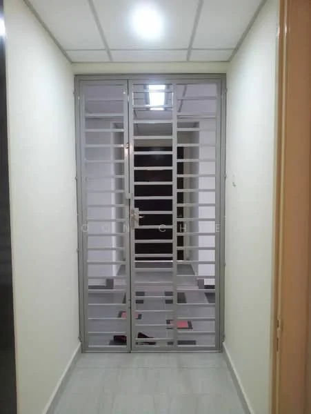 Room features: grey metal security gate, white painted walls, tile flooring, ceiling lights, open corridor layout.