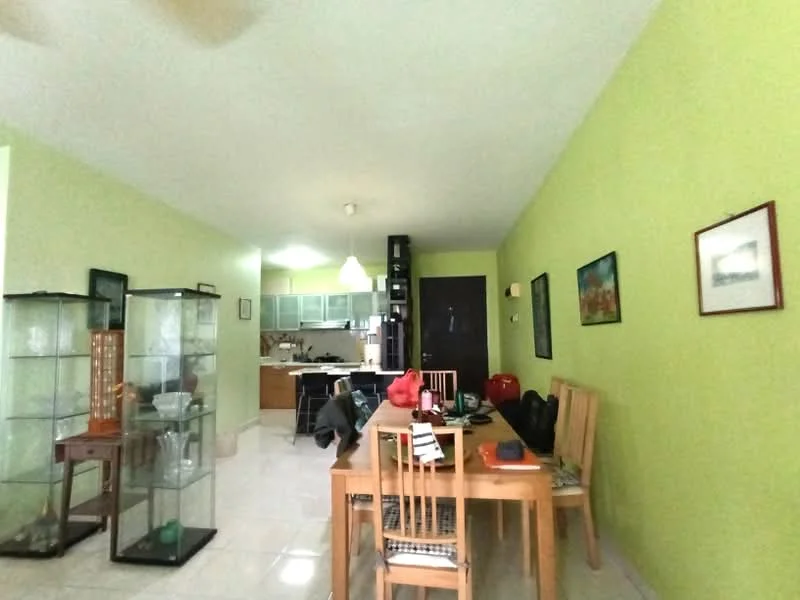 Living features: green painted walls, glossy tile flooring, dining table with wooden chairs, glass display cabinets, recessed ceiling lights, pendant light, open kitchen area visible, wall-mounted artwork; style: modern.