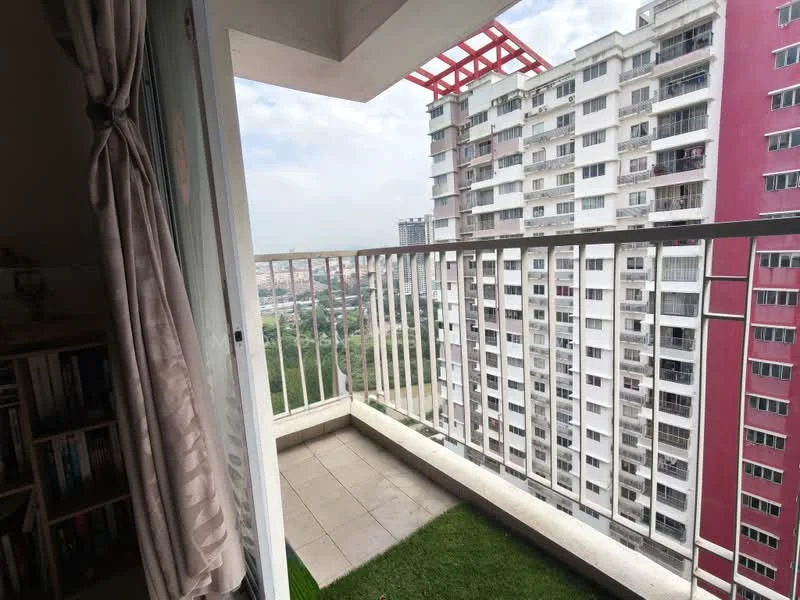 Room features: balcony with railing, tile flooring, green grass mat, city view, surrounding buildings visible, overhead awning, partially enclosed space; style: modern; view: city.