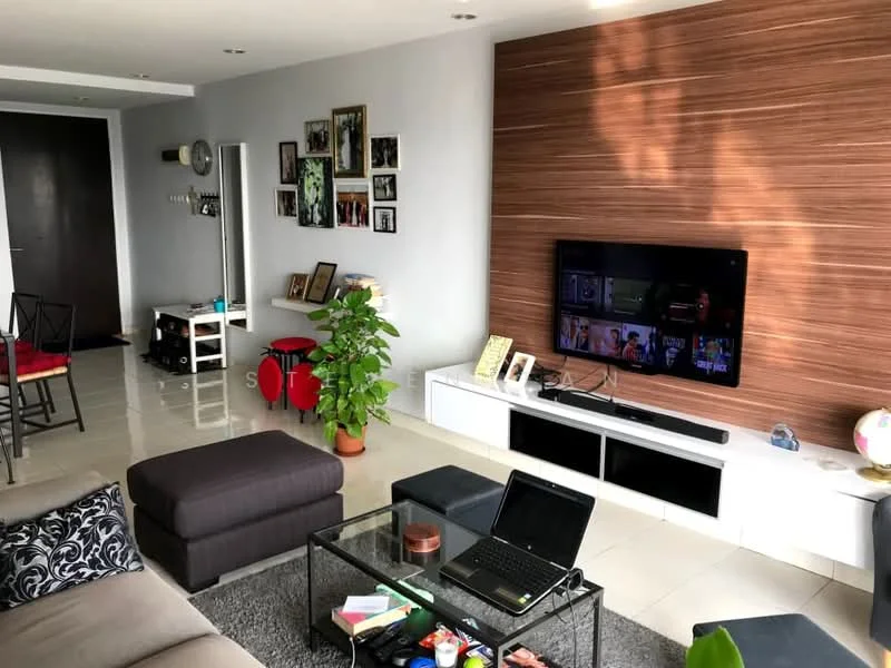 Living features: grey fabric sofa, black and white patterned throw pillows, glass coffee table, black TV console, wall-mounted flat-screen TV, wood accent wall, white tiled flooring, indoor plant in pot, decorative items on console, framed photographs on wall, wall clock, open space layout; style: modern.