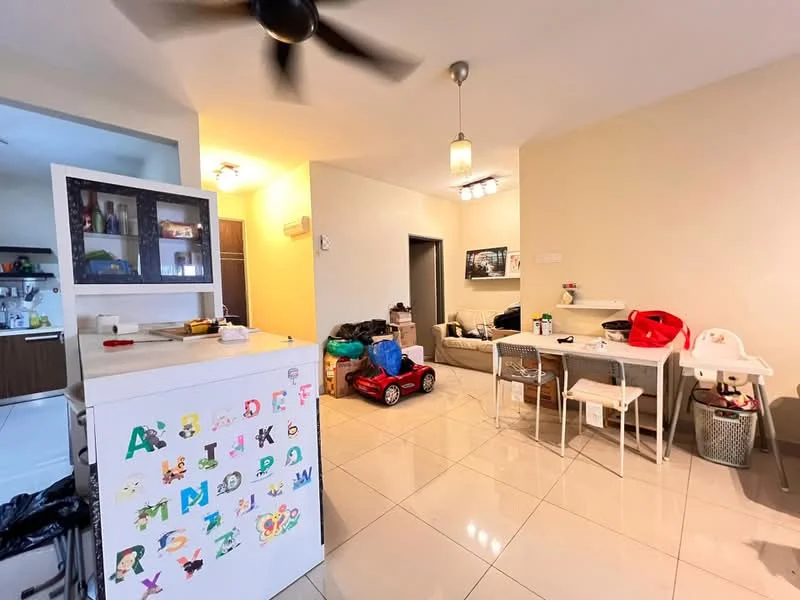 Living features: white painted walls, glossy ceramic tile flooring, ceiling fan, recessed downlights, sofa in beige, dining table with chairs, kitchen island with storage, decorative wall art, toys and children's items scattered, open layout, natural light from windows; style: modern. Kitchen features: kitchen cabinets with glass doors, countertop with storage, kitchen appliances visible, open shelving, refrigerator, sink; style: modern.