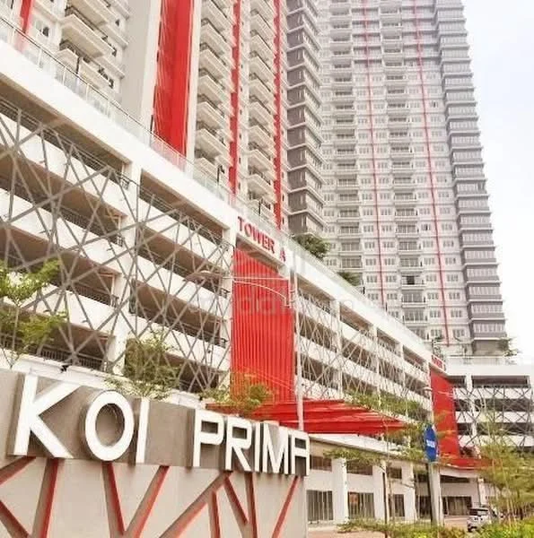 Exterior type: high-rise condominium; features: red and white painted facade, glass curtain wall, exposed concrete structure, multi-storey car park, landscaped entrance, signage with 'Koi Prima', balconies on upper floors, modern architectural design; style: modern.