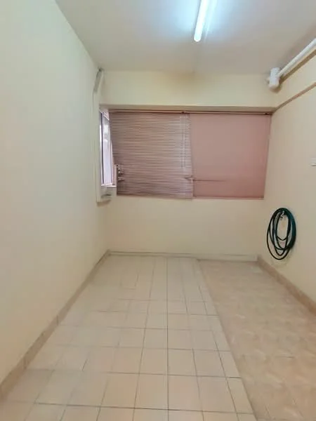 Room features: cream painted walls, tile flooring, window with blinds, hose reel on wall, fluorescent ceiling lights.