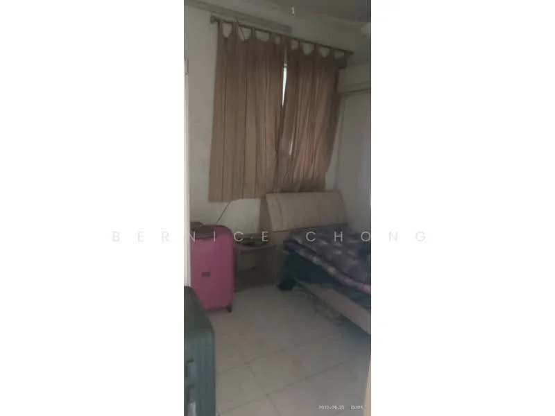 Room features: light-colored walls, curtains, window, bed with bedding, mattress, suitcase, floor tiles, small bedside table.
