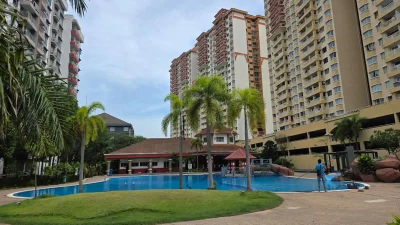 Exterior type: high-rise condominium; features: swimming pool, pool deck with loungers, landscaped garden with grass, palm trees, surrounding high-rise buildings, outdoor dining pavilion, manicured lawn; style: modern.