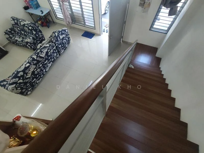 Living features: white painted walls, glossy tile flooring, wooden staircase, 2 patterned bean bag chairs, floor-to-ceiling windows, natural light, open layout, decorative items on the floor; style: modern. Room features: wooden railing, staircase leading to upper floor.