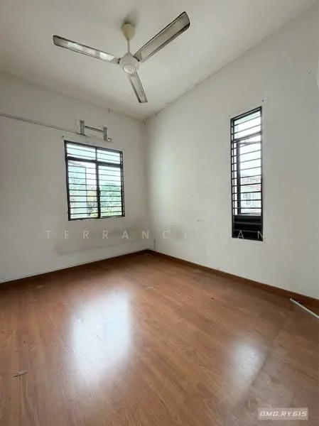 Room features: wooden flooring, white painted walls, ceiling fan, two vertical windows, natural light from windows, no visible furniture.