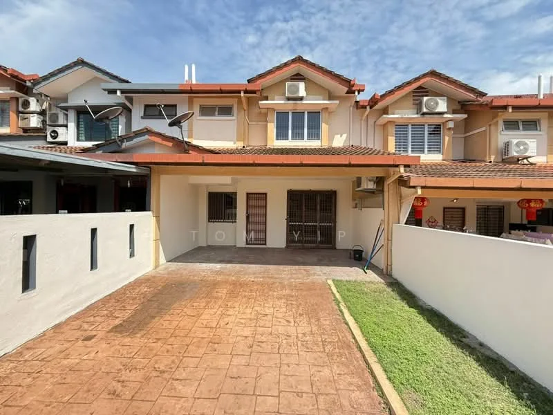 Exterior type: linked terrace house; features: single-storey, red tiled roof, cream painted facade, exposed brick wall, manicured lawn, driveway with stamped concrete, air conditioning units visible, front porch area, fenced boundary, windows with grilles; style: modern.