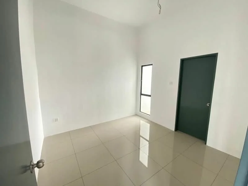 Room features: white painted walls, glossy tile flooring, single-pane window, green door, door handle, ceiling with no visible fixtures.