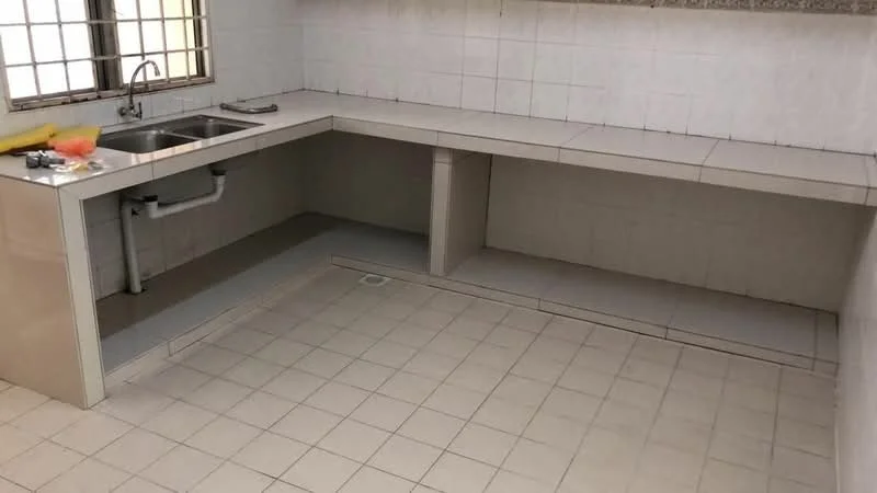 Kitchen features: single-bowl stainless-steel sink, chrome faucet, white tiled walls, light grey tiled flooring, built-in countertop, under-counter storage space, open shelving, window for natural light.