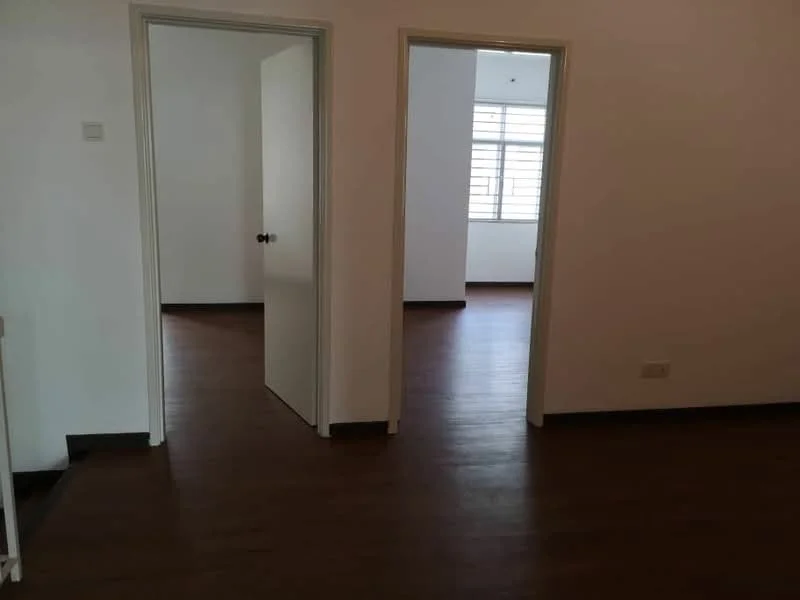 Room features: wooden flooring, white painted walls, doorway leading to another room, window with horizontal slats, neutral color scheme.