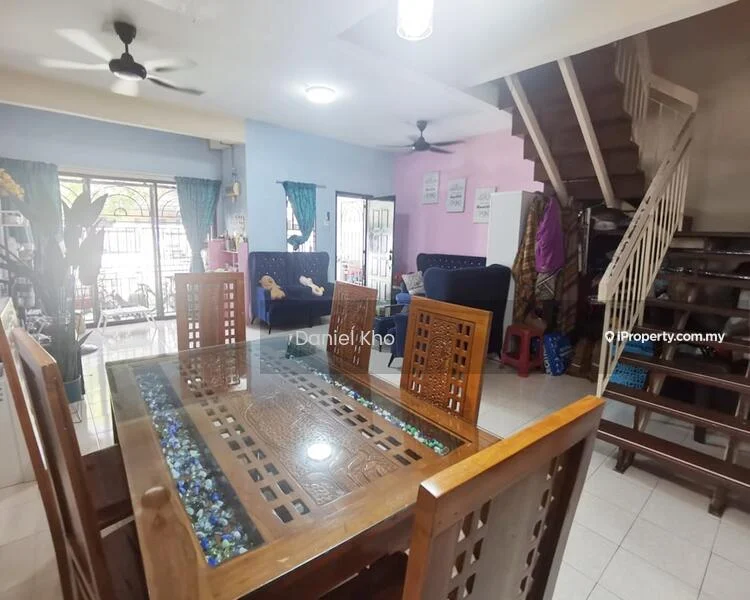 Dining features: 6-seater wooden dining table with glass inlay, blue upholstered dining chairs, white tiled flooring, ceiling fan with light, decorative wall with pink paint, green curtains, open layout to living area, wall-mounted decor, indoor plants, staircase visible in background; style: modern. Living features: blue fabric sofa, wooden coffee table, wall-mounted TV, decorative cushions, floor-to-ceiling windows, light-colored walls, ceiling fan, area rug, bookshelf, toys visible; style: modern.