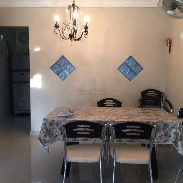 Dining features: dining table with floral tablecloth, 4 dining chairs with metal frame, chandelier with multiple bulbs, cream painted walls, glossy tile flooring, decorative diamond wall accents, ceiling fan, wall-mounted phone; style: modern. Room features: kitchen area visible in background, refrigerator visible.