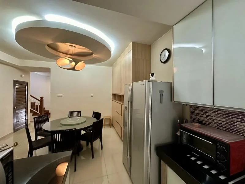 Kitchen features: round dining table, black dining chairs, stainless-steel fridge, built-in oven, black countertop, white cabinetry, wooden cabinetry, pendant lighting, recessed ceiling lights, mosaic tile backsplash, wall clock; style: modern.