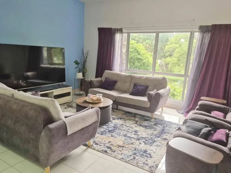 Living features: grey fabric 3-seater sofa, beige fabric 2-seater sofa, black coffee table, area rug with floral pattern, large flat-screen TV, floor-to-ceiling windows, purple curtains, potted plant, side table, armchair with armrests; style: modern; view: garden.