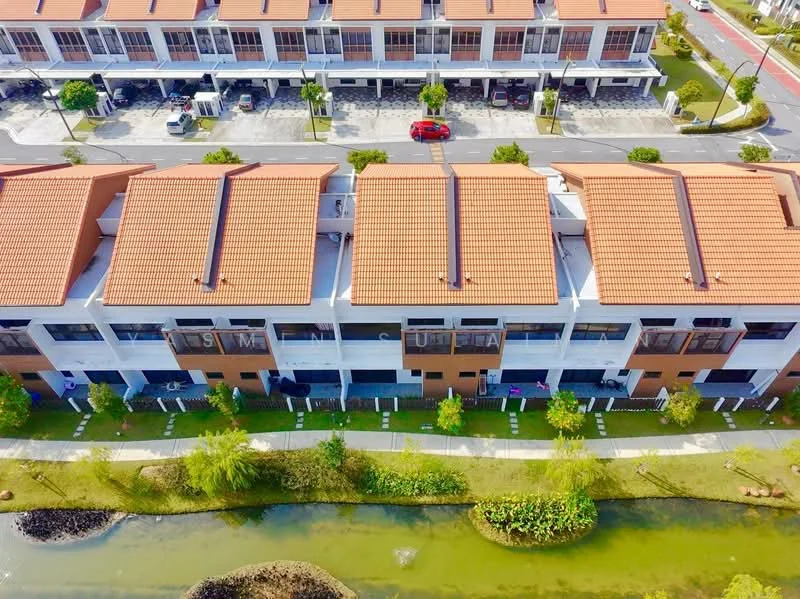 Exterior type: linked terrace house; features: red tile roof, two-storey building, manicured lawn, landscaped garden, water feature with pond, parking spaces visible, surrounded by greenery, paved walkway, balconies on upper floor, modern facade with large windows; style: modern.