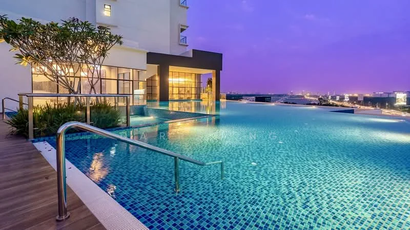 Exterior type: high-rise condominium; features: infinity pool, pool deck with loungers, glass railing, landscaped garden with plants, tiled pool surface, night lighting, surrounding city view; style: modern.