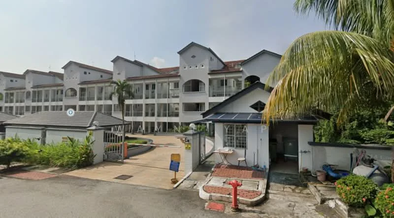 Exterior type: low-rise apartment block; features: white painted facade, red tile roof, balconies with railings, manicured landscaping, paved walkway, guard house at entrance, parking area, surrounded by greenery; style: modern.