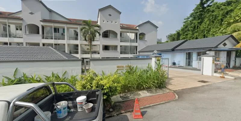 Exterior type: low-rise apartment block; features: white painted facade, flat roof, approximately 3-storey, manicured landscaping, palm trees, driveway with interlocking pavers, guard house at entrance, gated entry; style: modern.