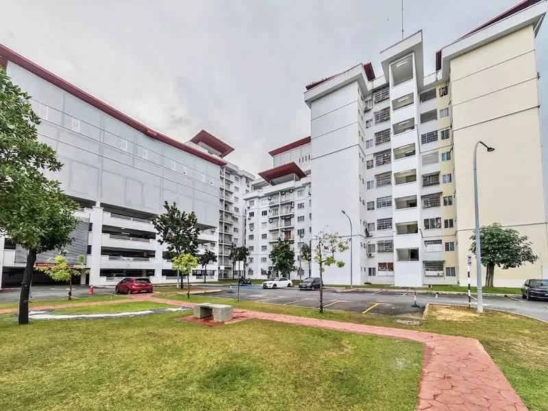 Exterior type: mid-rise condominium; features: white painted facade, red pitched roof, landscaped garden, manicured lawn, parking lot, multiple storeys, balconies on upper floors, surrounded by trees; style: modern.