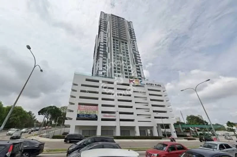 Exterior type: high-rise condominium; features: glass curtain wall, white painted facade, multi-storey car park, signage on building, surrounded by greenery, urban context with road access; style: modern.