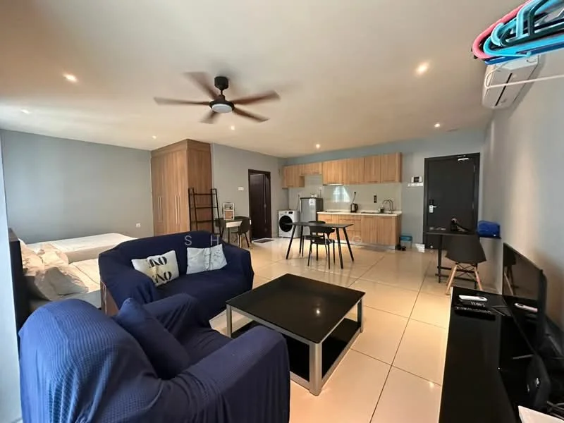 Living features: 3-seater fabric sofa in navy blue, coffee table, wall-mounted TV, ceiling fan with light, recessed downlights, tile flooring, grey painted walls, open layout to kitchen, air conditioning unit, decorative wall art; style: modern. Kitchen features: wood cabinetry, stainless-steel sink, built-in stove, microwave, refrigerator, countertop with bar seating, tile backsplash, washing machine, open shelving; style: modern. Bedroom features: queen-size bed, bedding with decorative pillows, built-in wardrobe, nightstand, lamp, window with natural light, grey painted walls; style: modern.