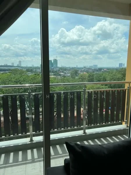 Room features: floor-to-ceiling windows, balcony with railing, city skyline view, curtains, outdoor greenery visible, concrete flooring, sofa, natural light; style: modern; view: city.
