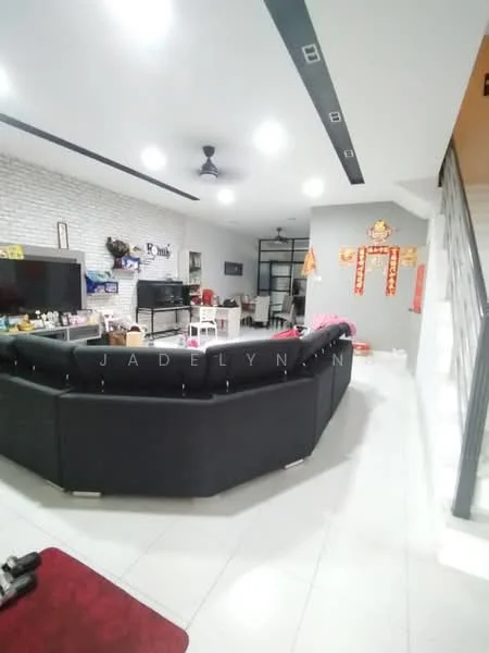 Living features: black L-shape sectional sofa, white painted walls, exposed brick accent wall, recessed downlights, ceiling fan, large flat-screen TV, TV console, white tile flooring, decorative wall with red decorations, open layout to dining area, area rug, decorative items on shelves; style: modern.