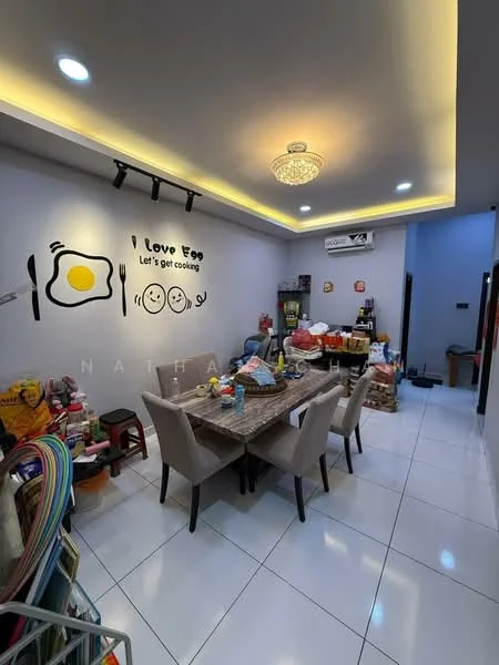 Dining features: white tiled flooring, grey painted walls, recessed ceiling lights, chandelier, dining table with 6 chairs, decorative wall art with egg motif, open shelving unit, various kitchen items and utensils, fridge, wall-mounted TV, decorative items on table; style: modern.