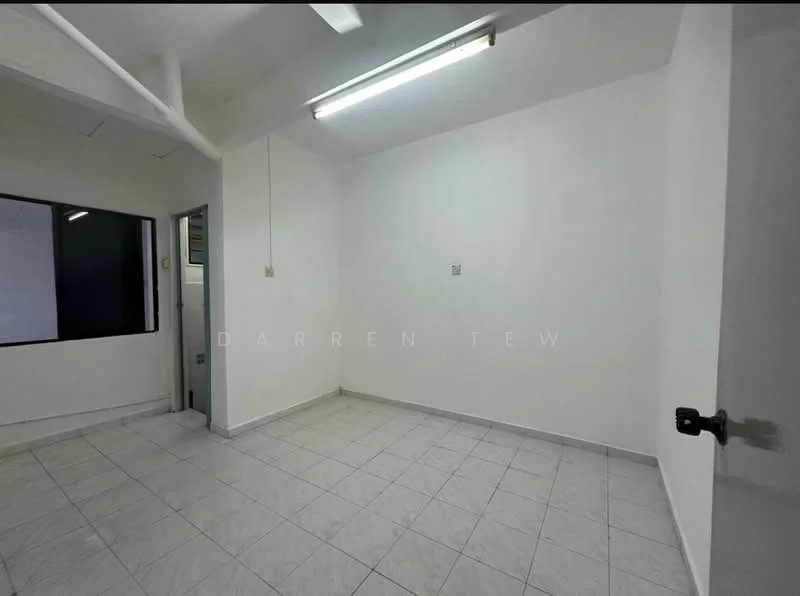 Room features: white painted walls, tile flooring, fluorescent ceiling lights, large window, neutral color scheme.