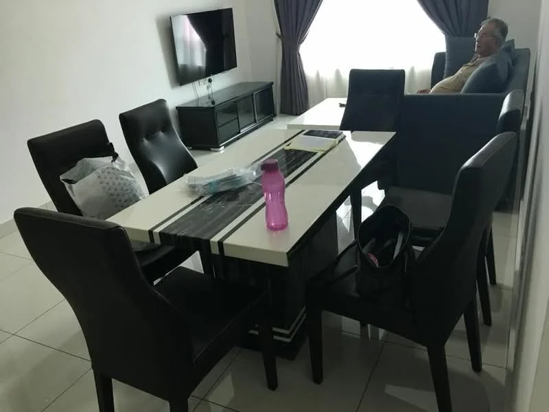 Dining features: rectangular dining table with black and white design, 6 upholstered dining chairs in black, wall-mounted flat-screen TV, black TV console, light-colored walls, large window with sheer curtains, grey sofa, decorative cushions on sofa, tile flooring; style: modern.