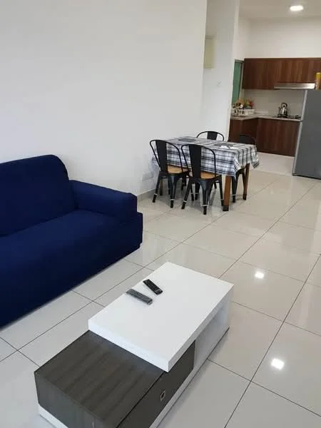 Living features: blue fabric sofa, white coffee table, flat-screen TV remote, glossy tile flooring, neutral painted walls, recessed lighting, open layout to dining area; style: modern. Dining features: 4-seater dining table with checkered tablecloth, black metal dining chairs, kitchen area visible in background, wood cabinetry, stainless-steel fridge; style: modern. Kitchen features: wood cabinetry, stainless-steel fridge, built-in stove, countertop workspace, open layout to dining area; style: modern.