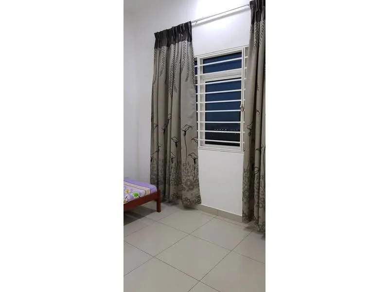Bedroom features: single bed, light-colored bedding, floor-to-ceiling window, white window frames, curtains with floral pattern, cream tiled flooring, white painted walls, wall-mounted light fixture.