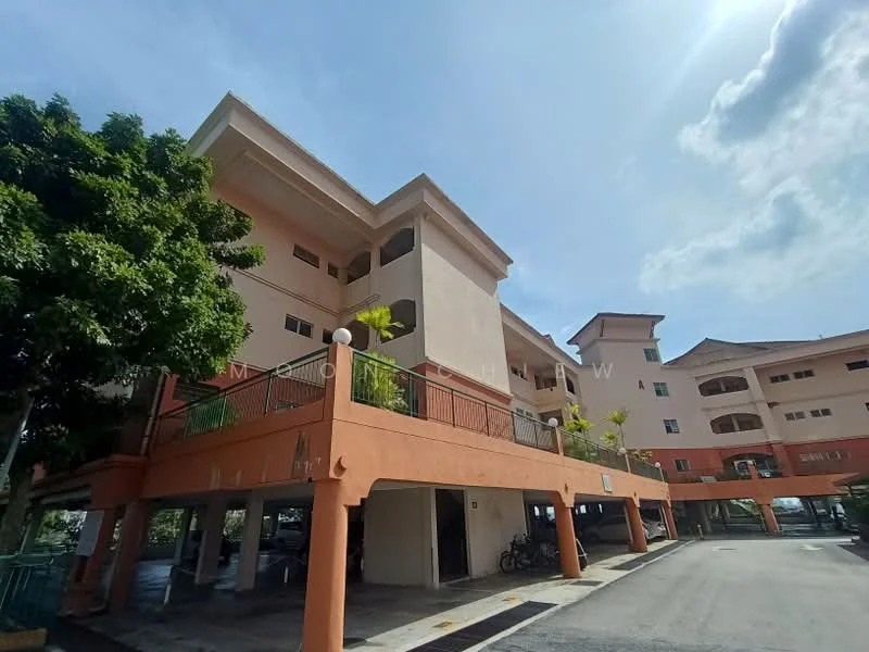 Exterior type: low-rise apartment block; features: cream painted facade, flat roof, approximately 3-storey, balconies on upper floors, manicured landscaping, parking area beneath building, bicycle parking visible, surrounded by greenery; style: modern.