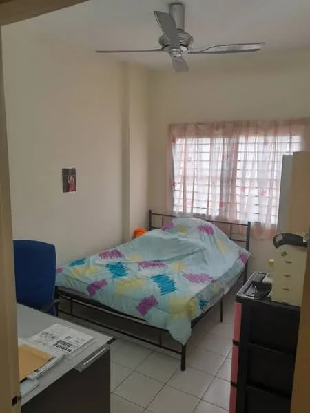 Bedroom features: single bed with colorful bedding, ceiling fan, window with sheer curtains, light-colored walls, tiled flooring, built-in wardrobe, desk with chair, small dresser.