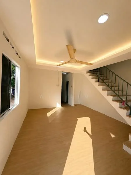 Living features: laminate flooring, white painted walls, tray ceiling with recessed lighting, 5-blade ceiling fan, large window with view to outside, staircase leading to upper floor, natural light from window, neutral color palette; style: modern; view: garden.
