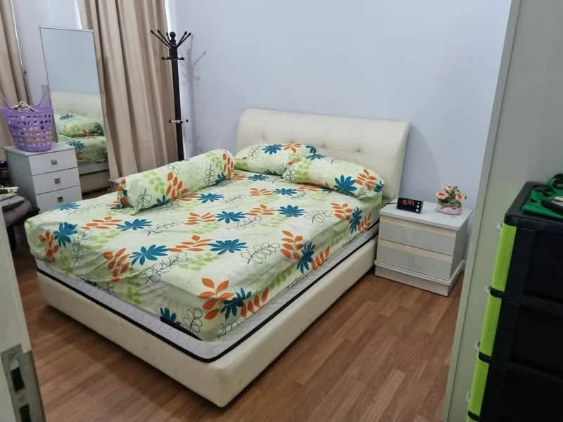 Bedroom features: queen-size bed with upholstered headboard, floral patterned bedding, wooden bedside table, table lamp on bedside table, full-length mirror, wooden flooring, curtains, decorative flower arrangement, clothes rack, wall-mounted clock; style: modern.